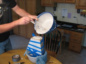 Pouring Plaster into mold